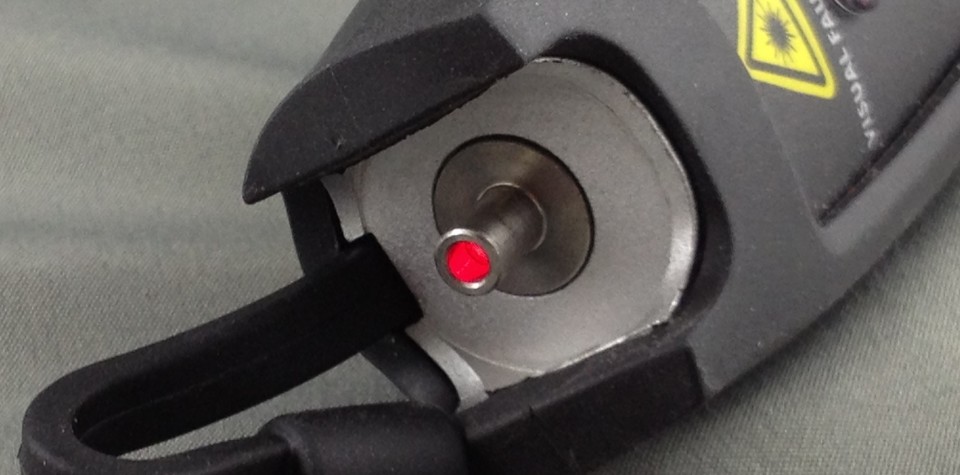 Visual fault locator with its red laser on